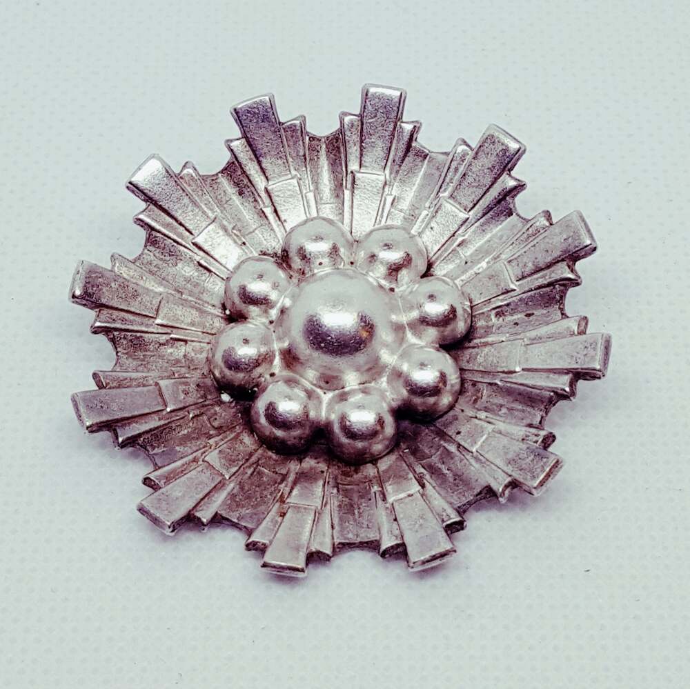 50s signed CORO Sunburst Flower silver brooch with necklace bail